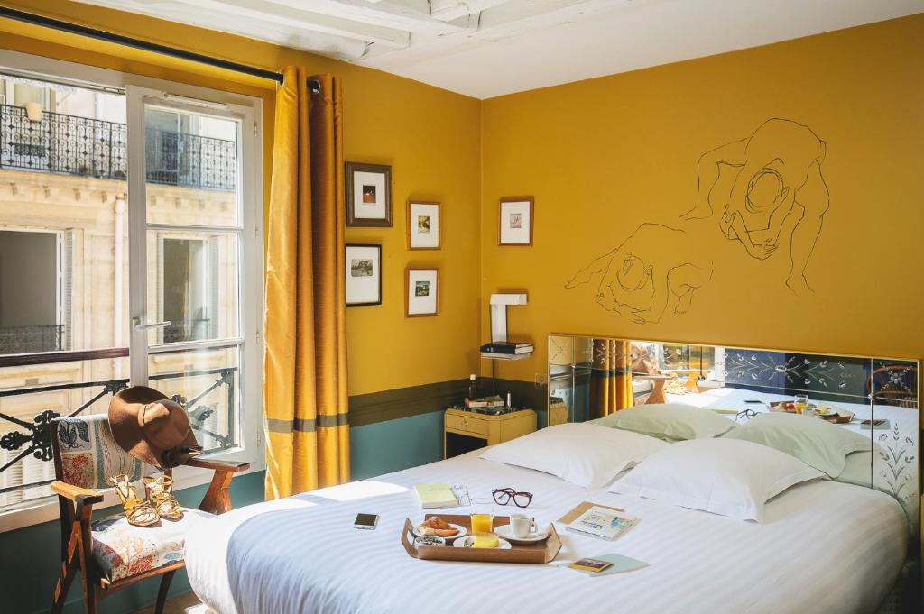 Quarto amarelo do Hôtel Crayon